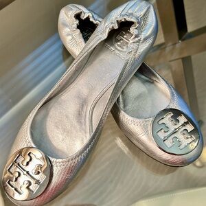 Tory Burch silver ballerina flats.